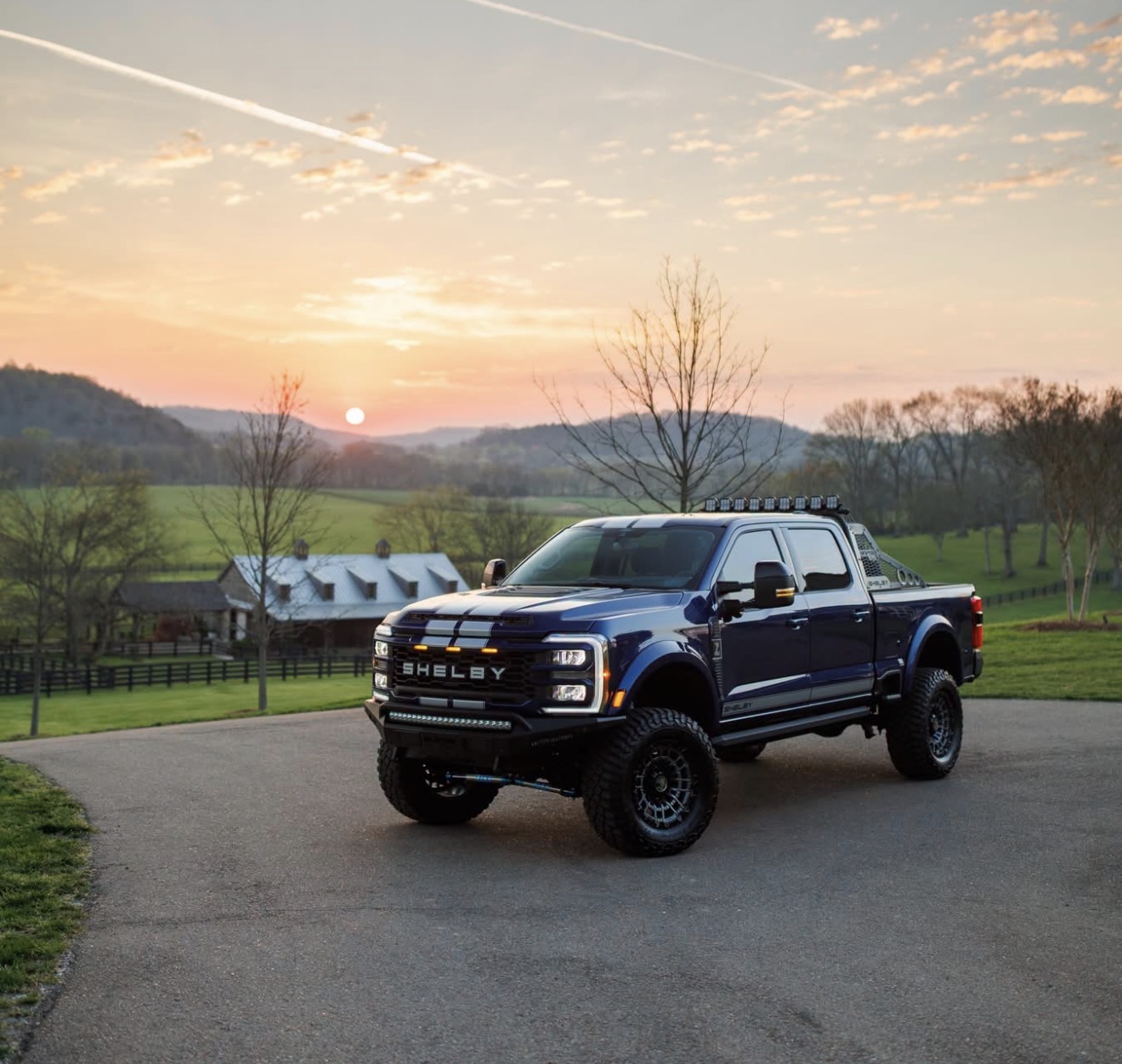 Blue Shelby Super Baja F-250 at sunset